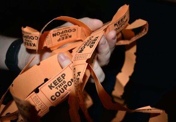 a group of brown bags with brown labels
