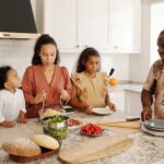 A Canadian family preparing a healthy meal together in the kitchen