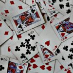 a pile of playing cards sitting on top of each other