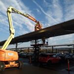 a crane that is sitting on a truck