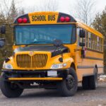 yellow school bus on road
