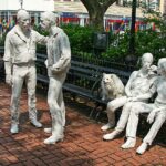 sitting man and woman statue