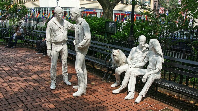 sitting man and woman statue