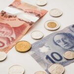 a bunch of money sitting on top of a table