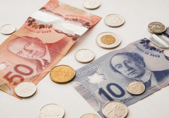 a bunch of money sitting on top of a table
