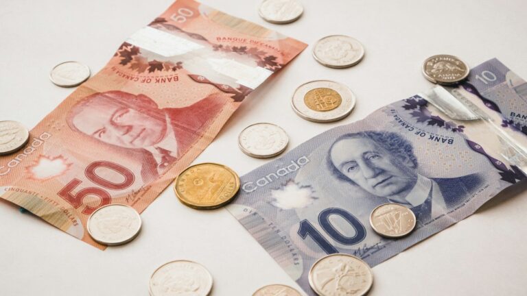 a bunch of money sitting on top of a table